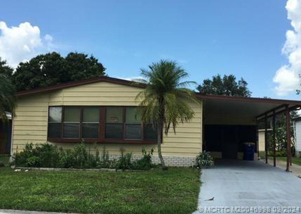 Photo of 14642 SW Divot Drive SW, Indiantown, FL 34956 (MLS # M20046998)