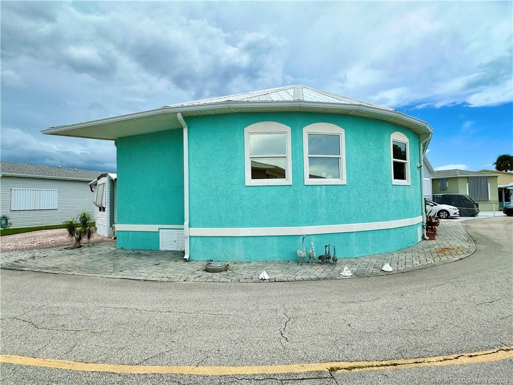 Photo of 963 Nettles Boulevard, Jensen Beach, FL 34957 (MLS # M20045969)