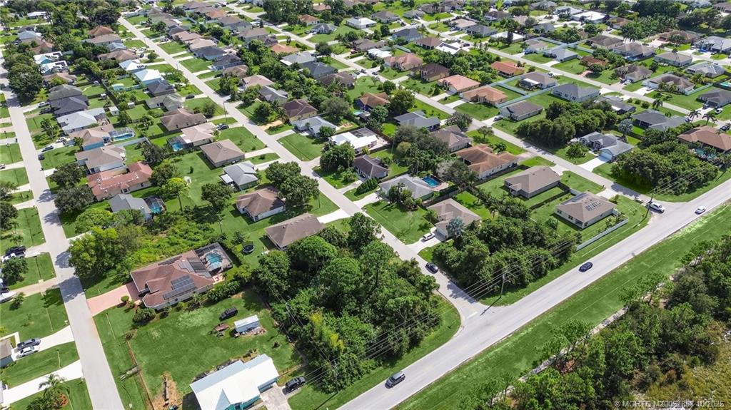 Photo of 3097 SW Rosser Boulevard, Port Saint Lucie, FL 34953 (MLS # M20052898)