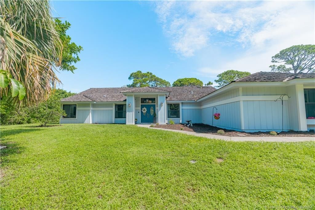 Photo of 835 NE Stokes Terrace, Jensen Beach, FL 34957 (MLS # M20046627)