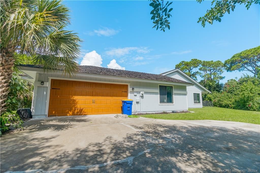 Photo of 835 NE Stokes Terrace, Jensen Beach, FL 34957 (MLS # M20046627)