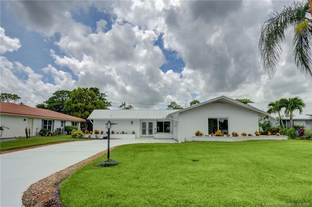 Photo of 1878 SE Coronado Lane, Stuart, FL 34996 (MLS # M20039061)