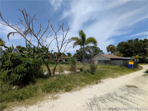 Photo of 2457 NE Hickory Avenue, Jensen Beach, FL 34957 (MLS # M20056703)
