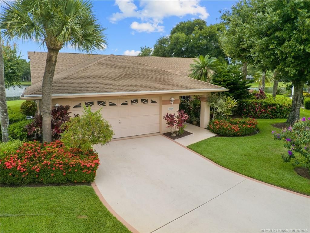 Photo of 2216 SW Oakwater Pointe, Palm City, FL 34990 (MLS # M20045810)