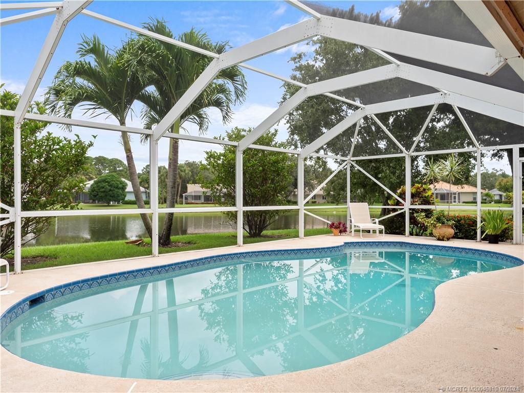 Photo of 2216 SW Oakwater Pointe, Palm City, FL 34990 (MLS # M20045810)