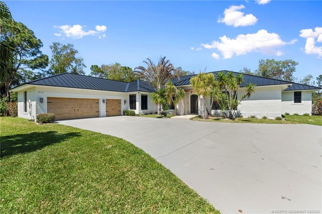 Photo of 9856 SW Pueblo Terrace, Palm City, FL 34990 (MLS # M20054807)