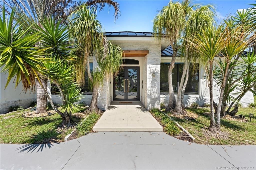 Photo of 9856 SW Pueblo Terrace, Palm City, FL 34990 (MLS # M20054807)