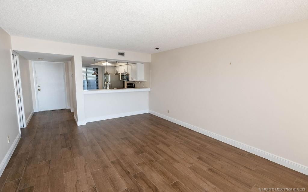 Photo of 4440 NE Sandpebble Trace #9-202, Stuart, FL 34996 (MLS # M20037564)