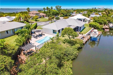 Photo of 103 Aqua Ra Drive, Jensen Beach, FL 34957 (MLS # M20056654)