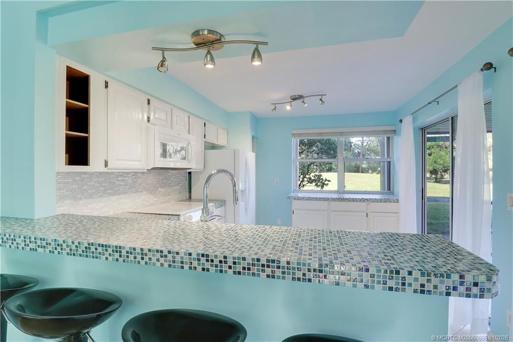 Photo of 3990 SW Greenwood Way #C, Palm City, FL 34990 (MLS # M20050985)