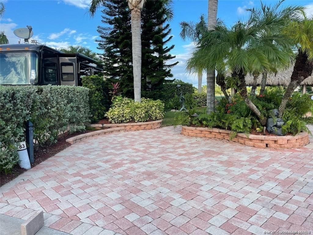 Photo of 83 NW Putter Pointe, Port Saint Lucie, FL 34986 (MLS # M20055496)