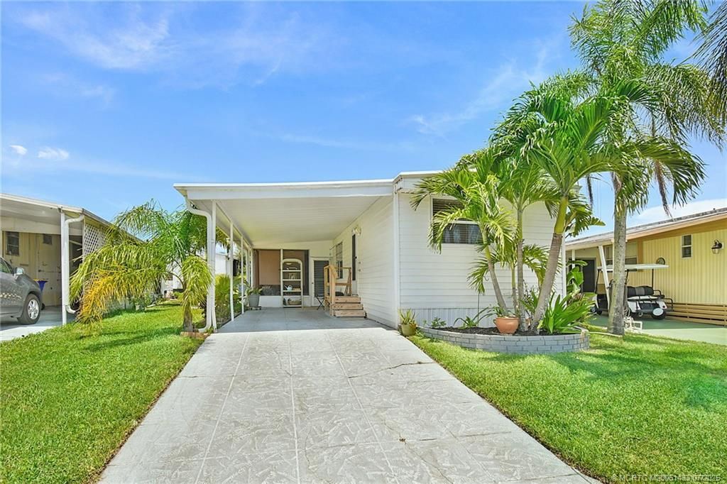 Photo of 612 S Seas Boulevard, Jensen Beach, FL 34957 (MLS # M20051433)