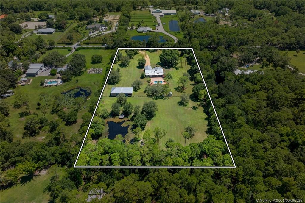 Photo of 5705 SW Woodham Street, Palm City, FL 34990 (MLS # M20051730)