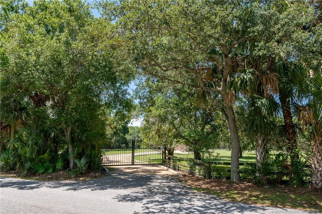 Photo of 5705 SW Woodham Street, Palm City, FL 34990 (MLS # M20051730)