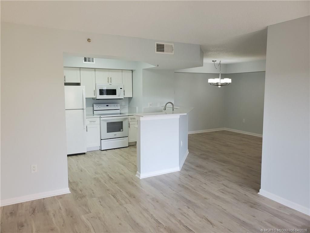 Photo of 3617 NW Adriatic Lane, Jensen Beach, FL 34957 (MLS # M20055205)