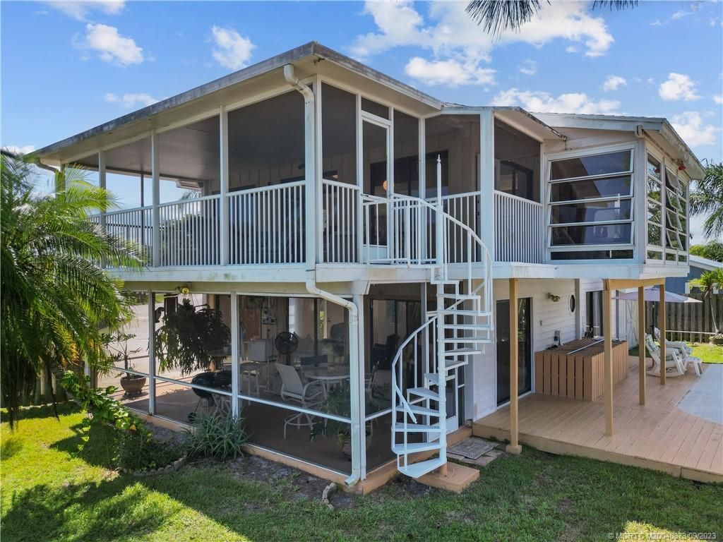 Photo of 1428 SW Rustic Lane, Palm City, FL 34990 (MLS # M20040873)