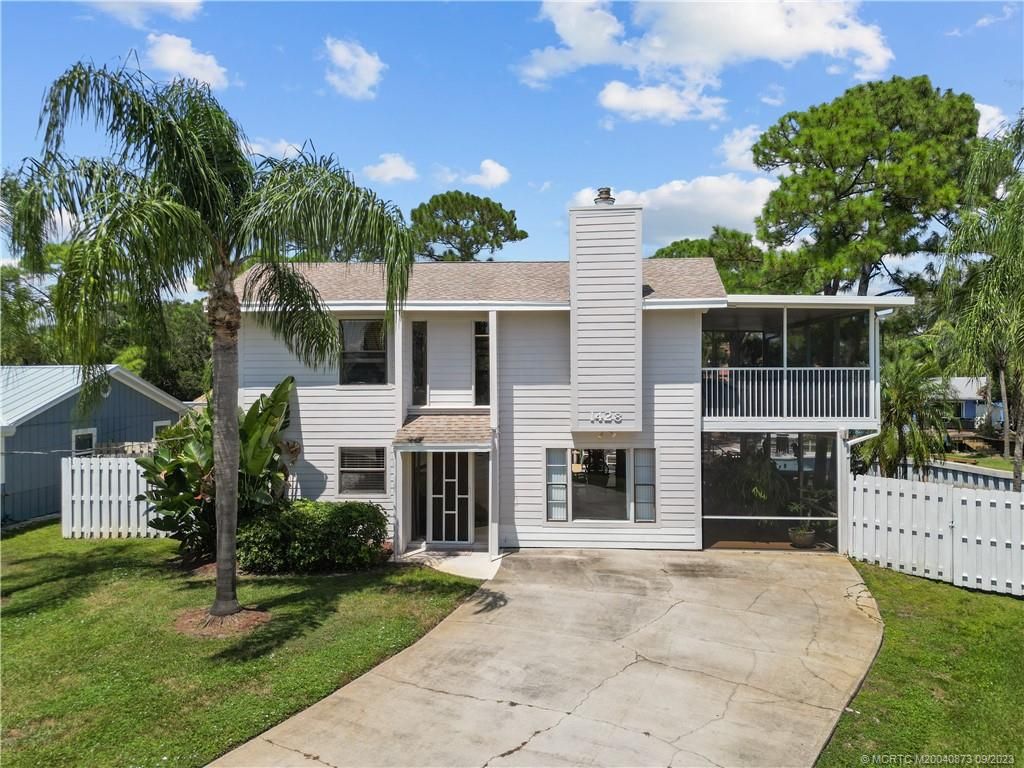 Photo of 1428 SW Rustic Lane, Palm City, FL 34990 (MLS # M20040873)