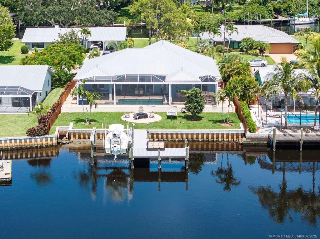 Photo of 562 SW Pine Tree Lane, Palm City, FL 34990 (MLS # M20051460)