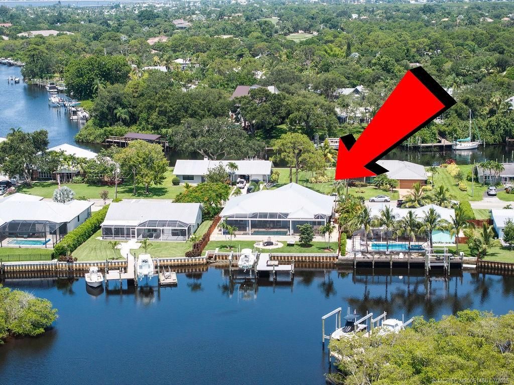 Photo of 562 SW Pine Tree Lane, Palm City, FL 34990 (MLS # M20051460)