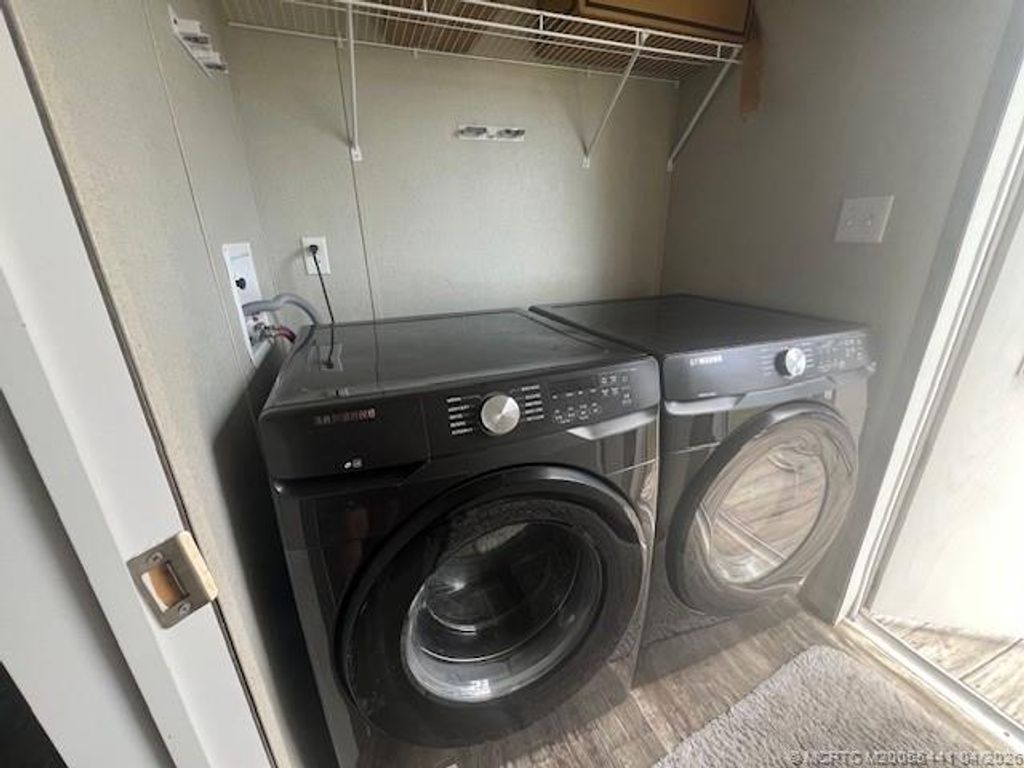 Photo of 3357 W Mayaguana Lane, Lake Worth, FL 33462 (MLS # M20055441)