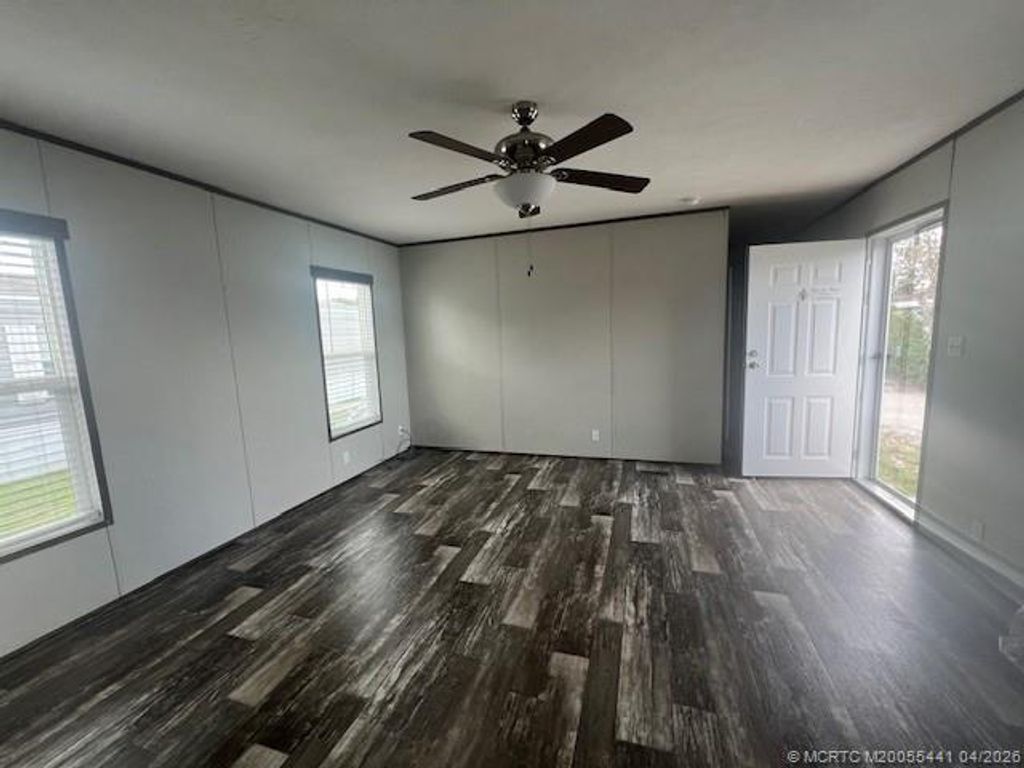 Photo of 3357 W Mayaguana Lane, Lake Worth, FL 33462 (MLS # M20055441)