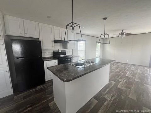 Photo of 3357 W Mayaguana Lane, Lake Worth, FL 33462 (MLS # M20055441)