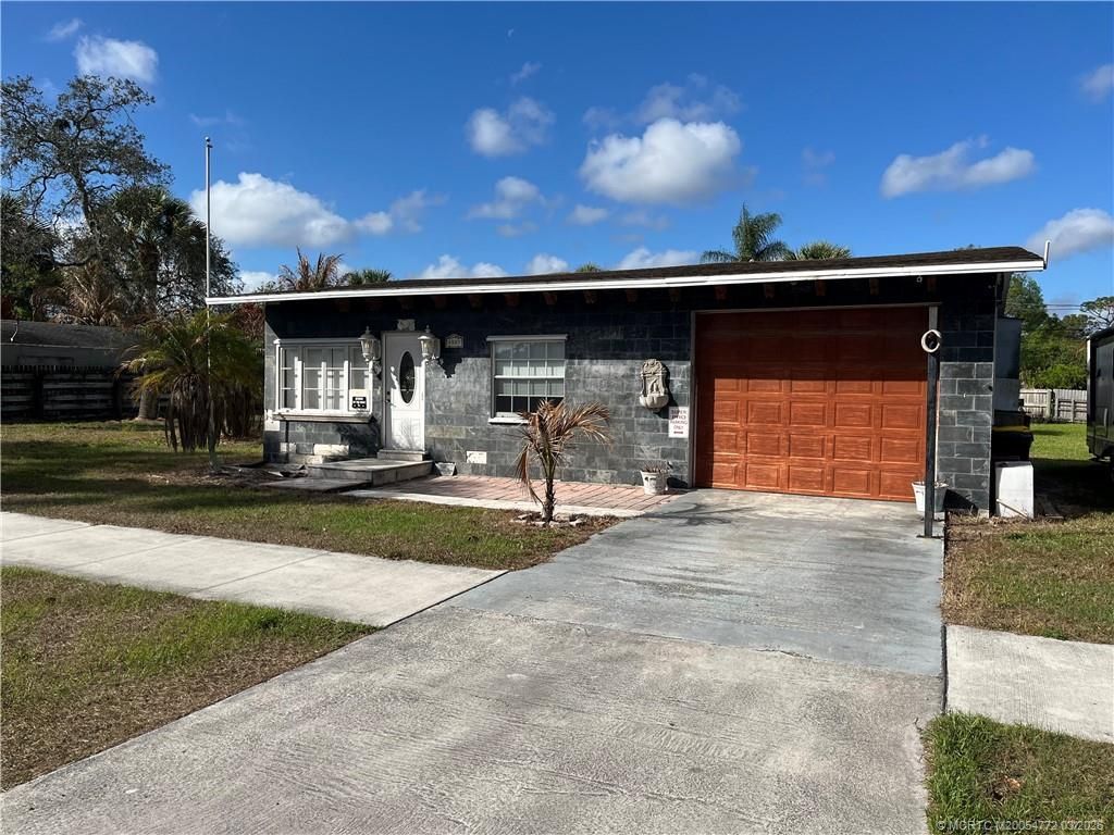 Photo of 4800 SE Ebbtide Avenue, Port Salerno, FL 34997 (MLS # M20054772)