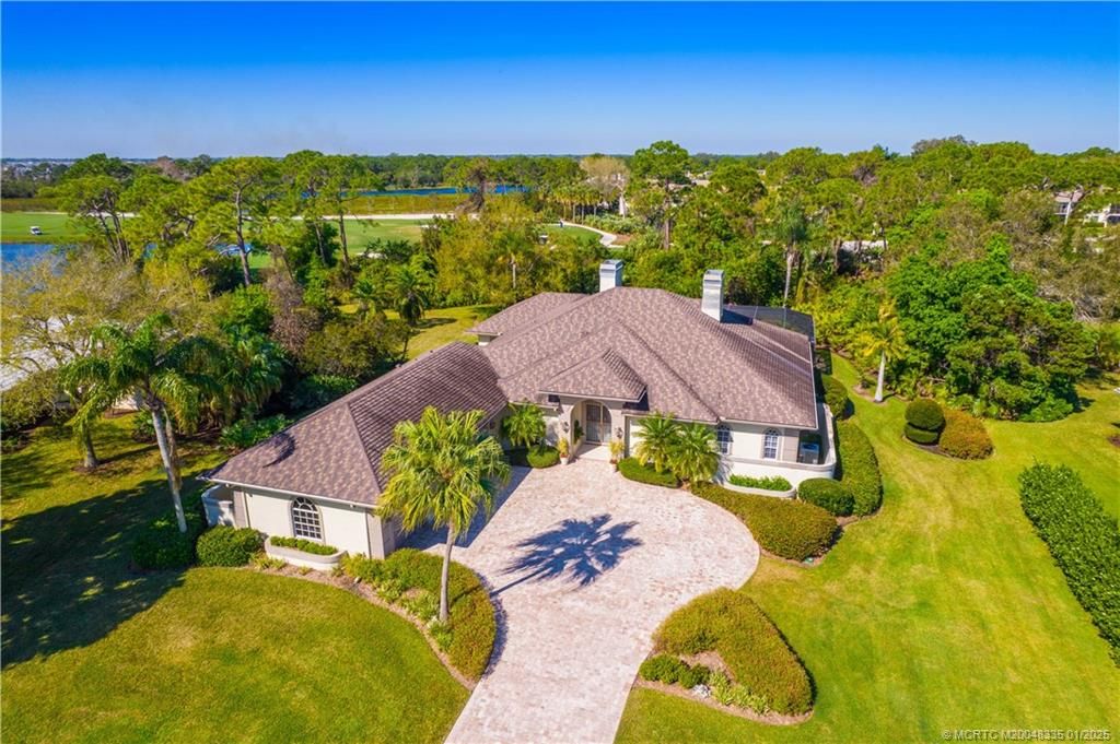 Photo of 13407 NW Wax Myrtle Trail, Palm City, FL 34990 (MLS # M20048335)