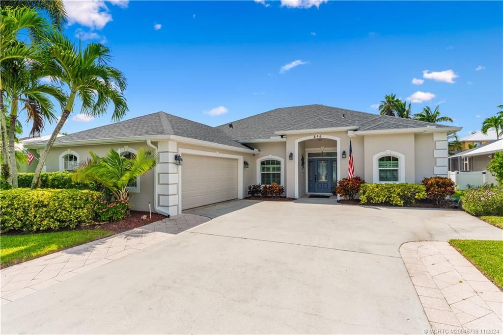 Photo of 486 NW Fetterbush Way, Jensen Beach, FL 34957 (MLS # M20046739)