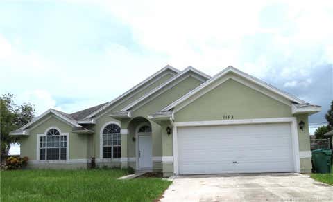 Photo of 1102 SW Coleman Avenue, Port Saint Lucie, FL 34953 (MLS # M20056527)