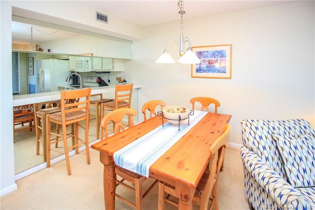 Photo of 4620 NE Sandpebble Trace #104, Stuart, FL 34996 (MLS # M20053261)