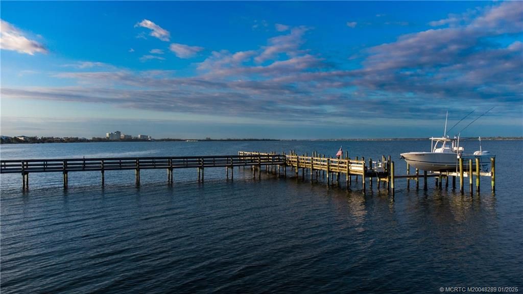 Photo of 7671 Pelican Pointe Drive, Jensen Beach, FL 34957 (MLS # M20048289)