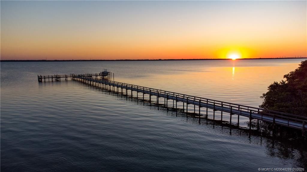 Photo of 7671 Pelican Pointe Drive, Jensen Beach, FL 34957 (MLS # M20048289)