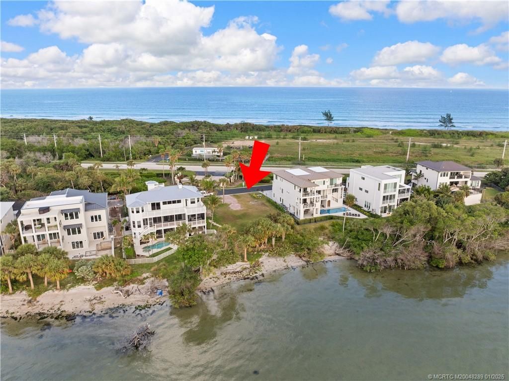 Photo of 7671 Pelican Pointe Drive, Jensen Beach, FL 34957 (MLS # M20048289)