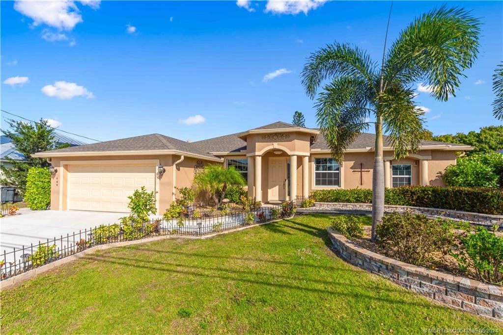 Photo of 949 SW McDevitt Avenue, Port Saint Lucie, FL 34953 (MLS # M20043869)