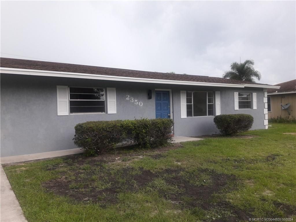 Photo of 2350 SE Glover Street, Port Saint Lucie, FL 34984 (MLS # M20044928)