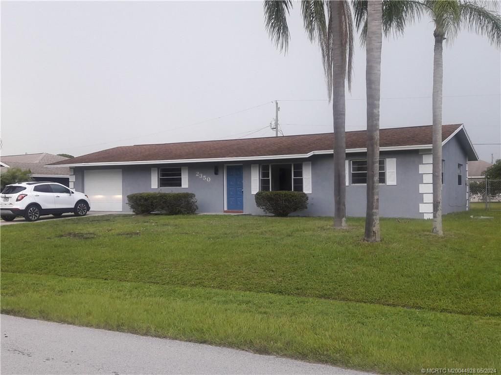 Photo of 2350 SE Glover Street, Port Saint Lucie, FL 34984 (MLS # M20044928)