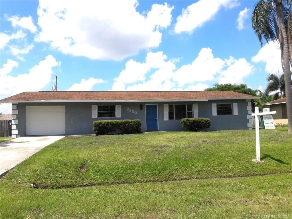 Photo of 2350 SE Glover Street, Port Saint Lucie, FL 34984 (MLS # M20044928)