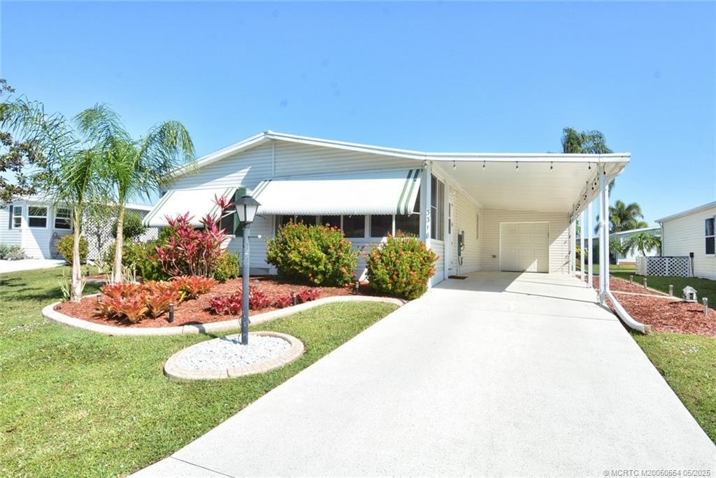 Photo of 3318 Columbrina Circle, Port Saint Lucie, FL 34952 (MLS # M20050554)