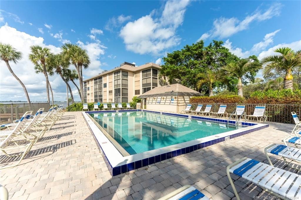 Photo of 4540 NE Sandpebble Trace #304, Stuart, FL 34996 (MLS # M20042198)