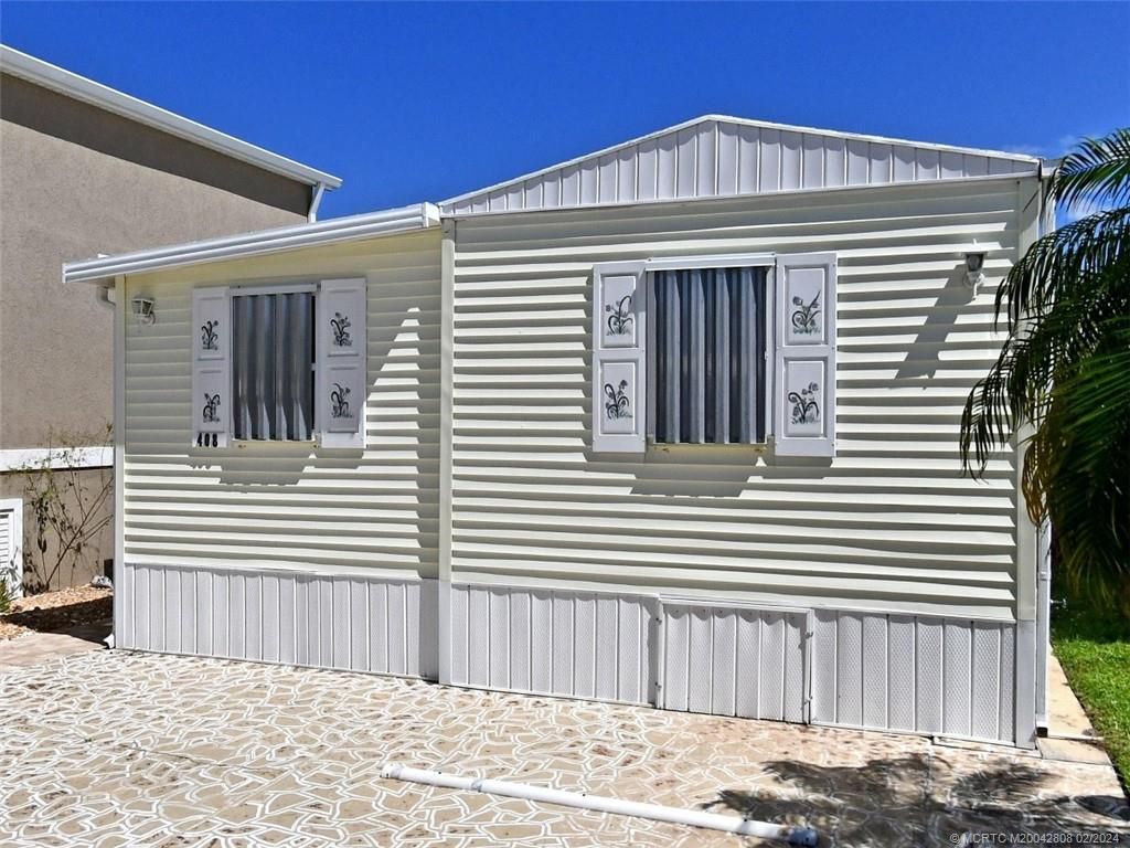 Photo of 408 Nettles Boulevard, Jensen Beach, FL 34957 (MLS # M20042808)