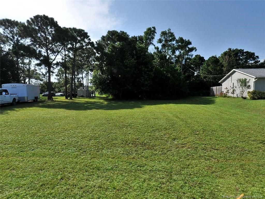 Photo of 410 SW Dauphin Avenue, Port Saint Lucie, FL 34953 (MLS # M20044657)