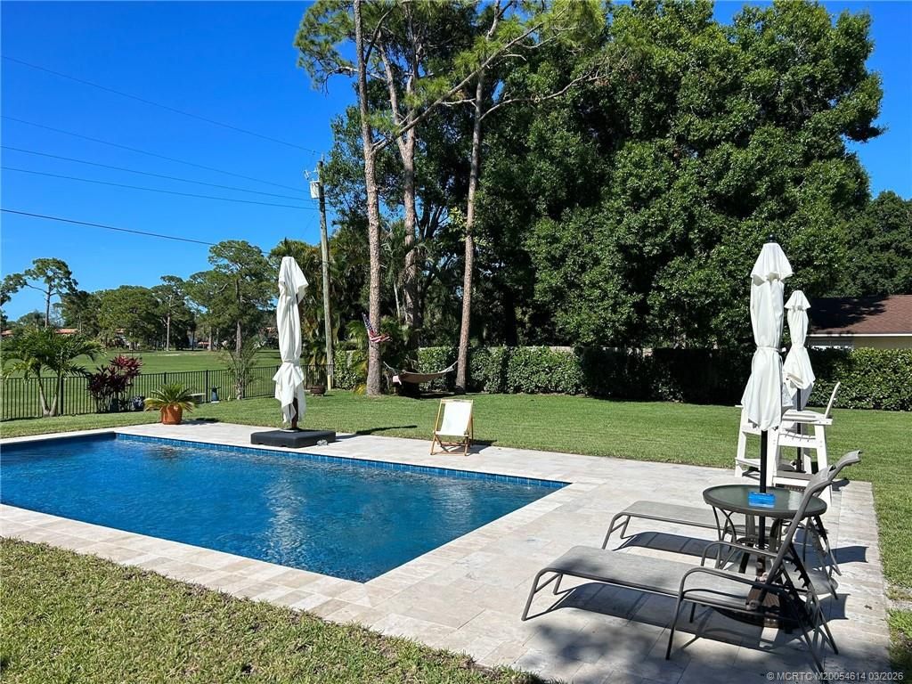 Photo of 1763 NW Spruce Ridge Drive, Stuart, FL 34994 (MLS # M20054614)