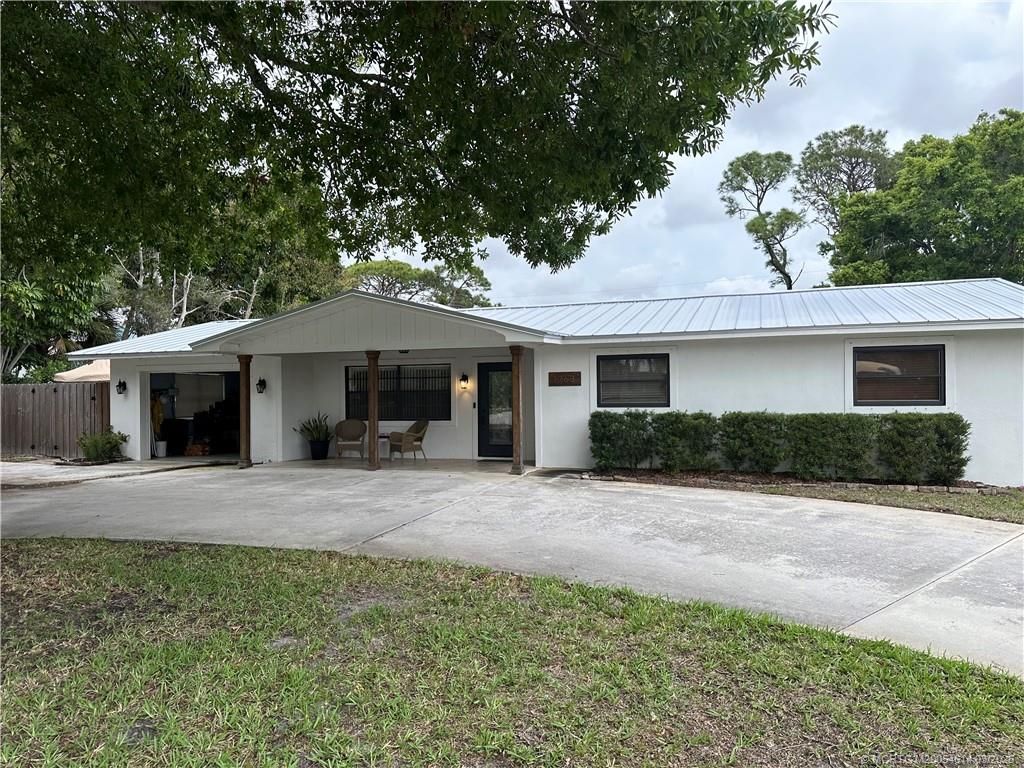 Photo of 1763 NW Spruce Ridge Drive, Stuart, FL 34994 (MLS # M20054614)