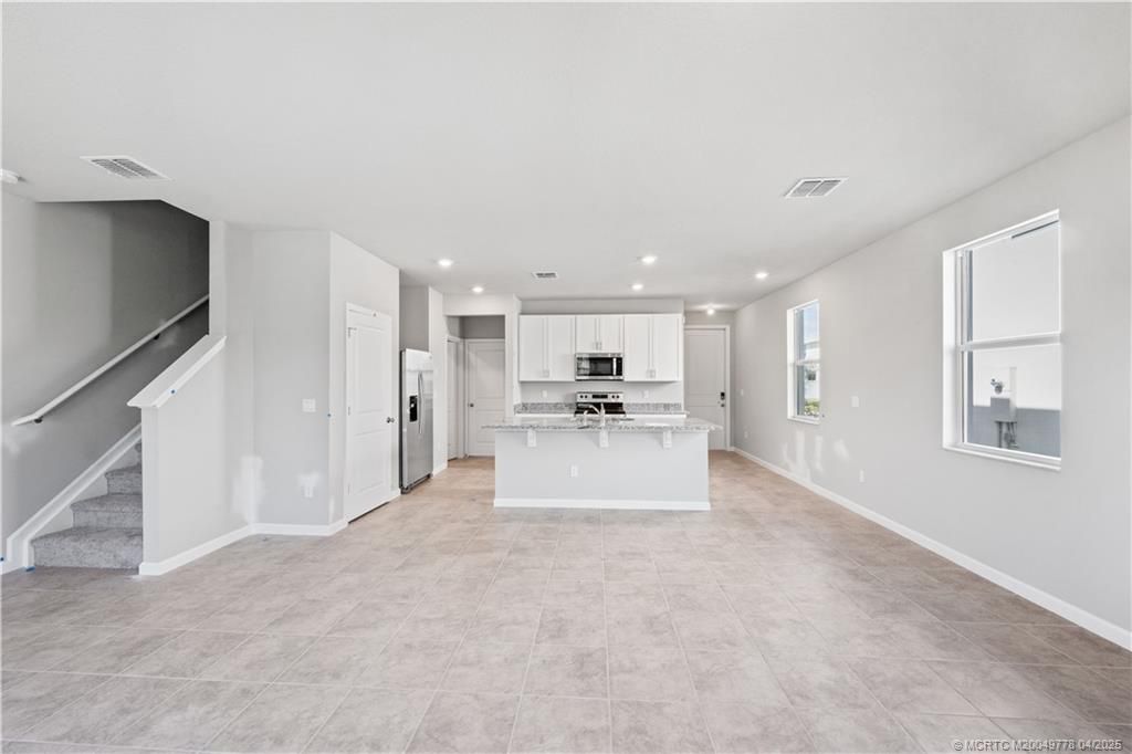 Photo of 162 W Osprey Preserve Boulevard, Jensen Beach, FL 34957 (MLS # M20049778)