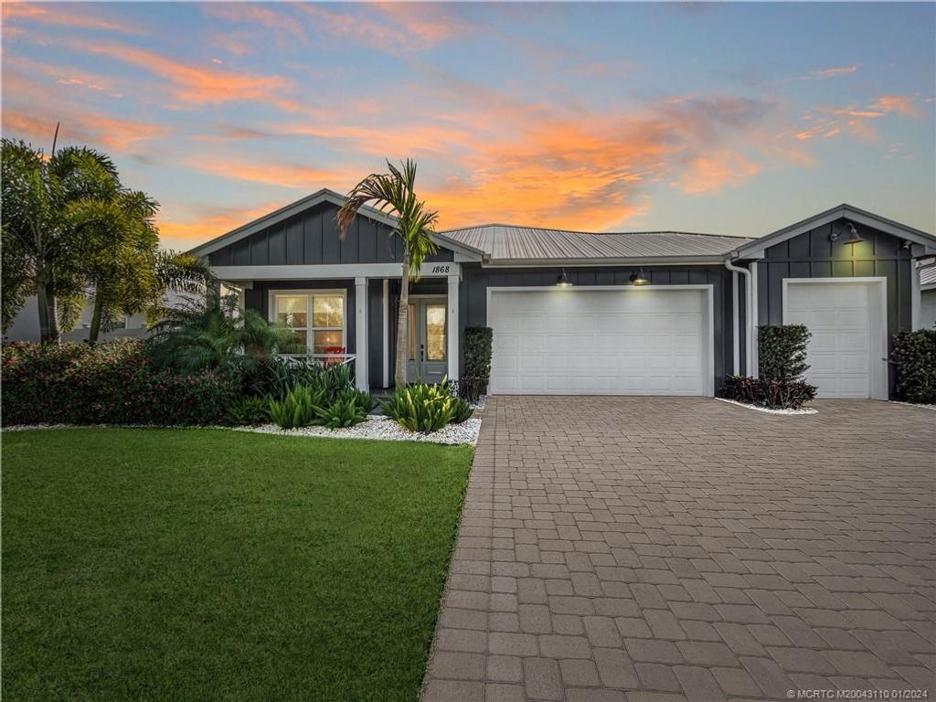 Photo of 1868 SW Pinewood Way, Palm City, FL 34990 (MLS # M20043110)