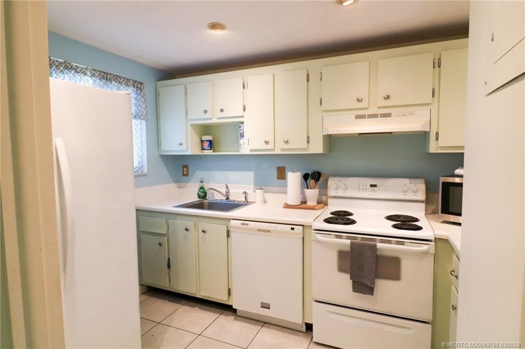 Photo of 5413 SE Miles Grant Road #103, Stuart, FL 34997 (MLS # M20043788)