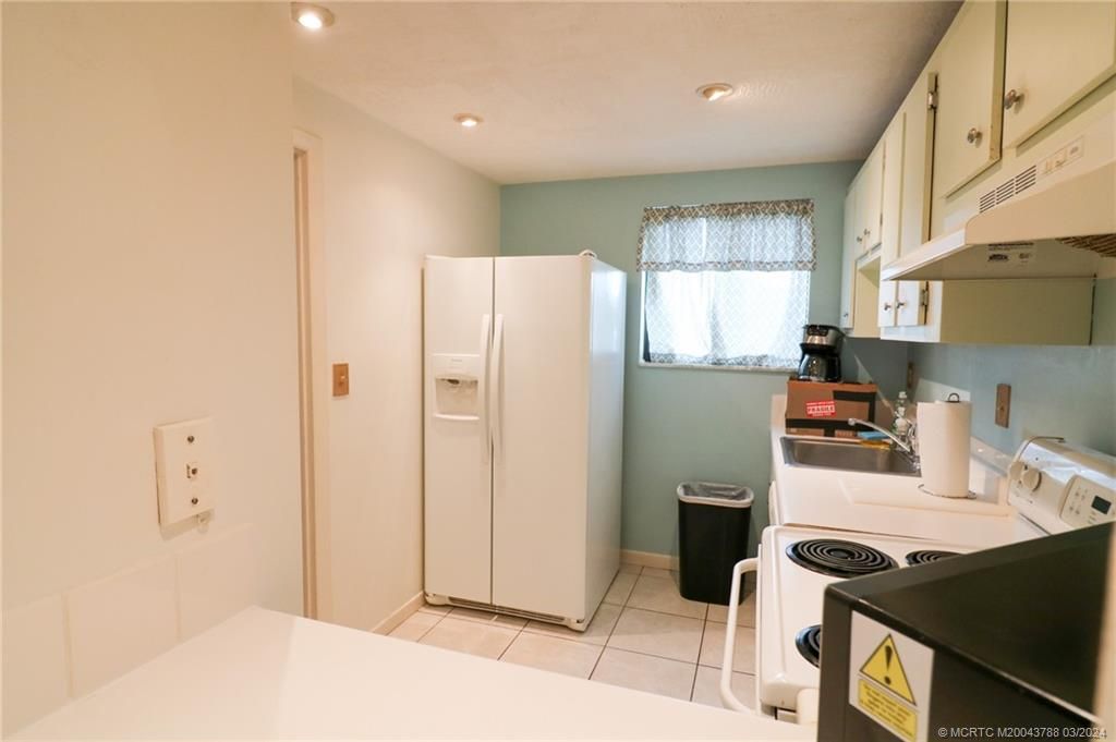 Photo of 5413 SE Miles Grant Road #103, Stuart, FL 34997 (MLS # M20043788)