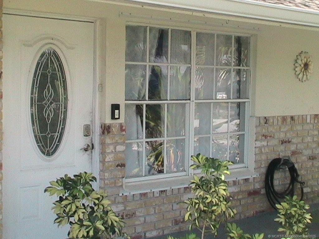 Photo of 2340 NE Rustic Way, Jensen Beach, FL 34957 (MLS # M20050045)