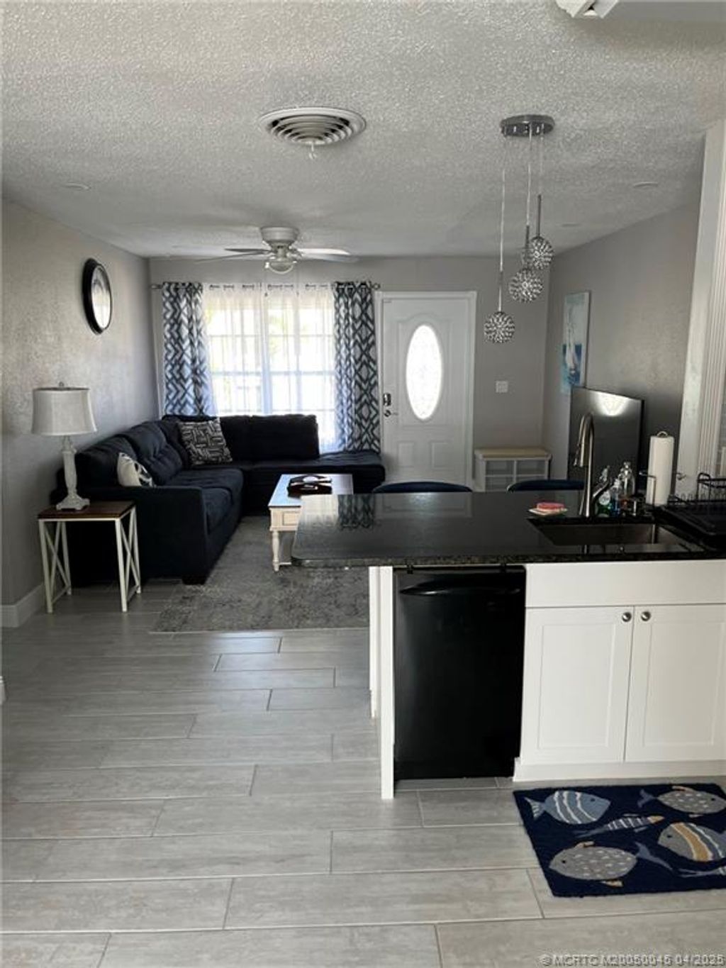 Photo of 2340 NE Rustic Way, Jensen Beach, FL 34957 (MLS # M20050045)